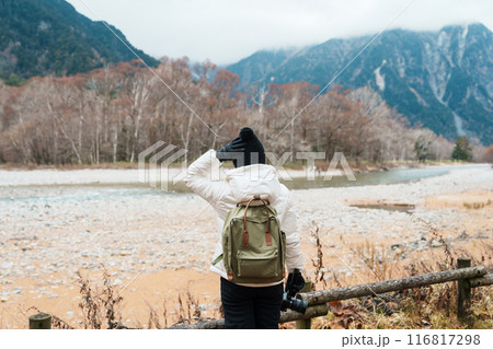 Woman tourist travel Kamikochi National Park, happy Traveler sightseeing Azusa river with mountain, Nagano Prefecture, Japan. Landmark for tourists attraction. Japan Travel, Destination and Vacation Woman tourist travel Kamikochi National Park, happy Traveler sightseeing Azusa river with mountain, Nagano Prefecture, Japan. Landmark for tourists attraction. Japan Travel, Destination and Vacation 116817298