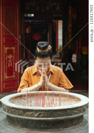 Asian Woman Praying In Old Temple 116817605