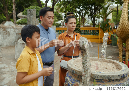 Asian Family Visiting Ancient Temple Asian Family Visiting Ancient Temple 116817662