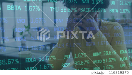 Image of multicolored trading board over tired african american woman working on laptop 116819870