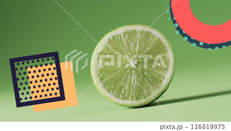 Composition of abstract shapes over halved lime on green background Composition of abstract shapes over halved lime on green background 116819975