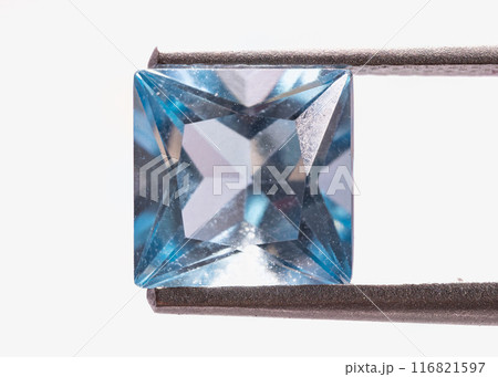natural blue topaz gem on the isolated white background natural blue topaz gem on the isolated white background 116821597