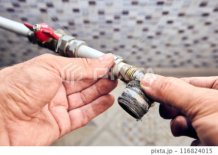 Crimp collet compression fitting angle with transition to an external thread in hands of plumber that eliminates leaks. 116824015