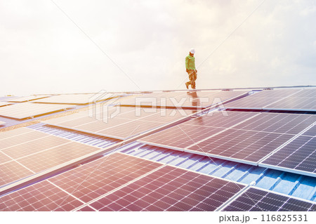 Professional Engineer Service Solar Panel. Worker Maintenance Cleaning Replacing Solar Panel. Solar photovoltaic panel system in Industry roof. Saving Energy with Clean Power. Professional Engineer Service Solar Panel. Worker Maintenance Cleaning Replacing Solar Panel. Solar photovoltaic panel system in Industry roof. Saving Energy with Clean Power. 116825531