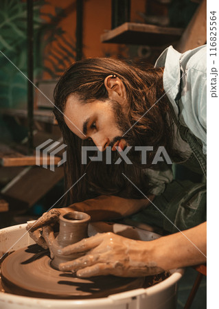 clay cup mug handcrafted man artist happy working proud look at finished hand craft product ceramic tea mug art project at workshop clay cup mug handcrafted man artist happy working proud look at finished hand craft product ceramic tea mug art project at workshop 116825564