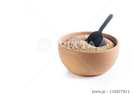 Rolled oats, healthy breakfast cereal oat flakes in bowl isolated on white background. 116827921