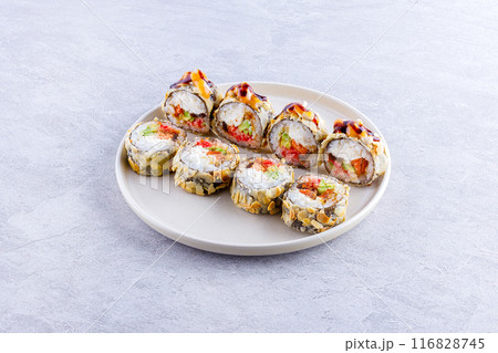 Japanese cuisine. Sushi roll on white background. 116828745