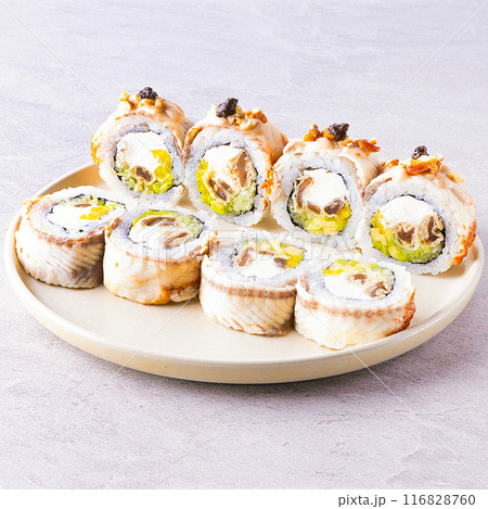 Japanese cuisine. Sushi roll on white background. 116828760
