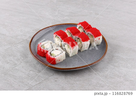 Japanese cuisine. Sushi roll on white background. 116828769