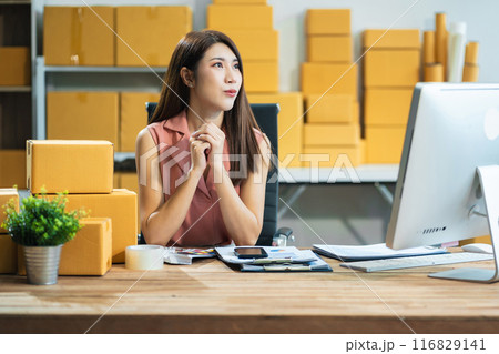 Successful Woman online seller. small business entrepreneur SME or Asian woman working freelance with online sell at home. Successful Woman online seller. small business entrepreneur SME or Asian woman working freelance with online sell at home. 116829141