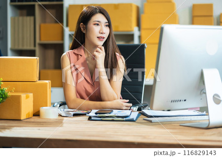 Successful Woman online seller. small business entrepreneur SME or Asian woman working freelance with online sell at home. 116829143