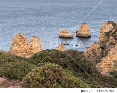 Carvoeiro boardwalk over the Algarve cliffs in Portugal. 116829162