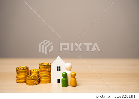 Miniature figures of the family stand near the house and coins. The concept of family budget, mortgage lending and money in the family. Real estate and housing Miniature figures of the family stand near the house and coins. The concept of family budget, mortgage lending and money in the family. Real estate and housing 116829191