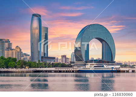 The Crescent Development Project in Baku, Azerbaijan, at sunset, with a ferry docked in the foreground The Crescent Development Project in Baku, Azerbaijan, at sunset, with a ferry docked in the foreground 116830060