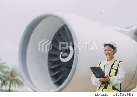 Technician fixing the engine of the airplane,Female aerospace engineering checking aircraft engines,Asian mechanic maintenance inspects plane engine Technician fixing the engine of the airplane,Female aerospace engineering checking aircraft engines,Asian mechanic maintenance inspects plane engine 116833692