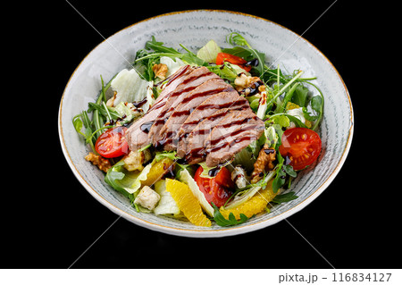 Duck Salad with Teriyaki Sauce on Black Background for Food Delivery Menu Duck Salad with Teriyaki Sauce on Black Background for Food Delivery Menu 116834127