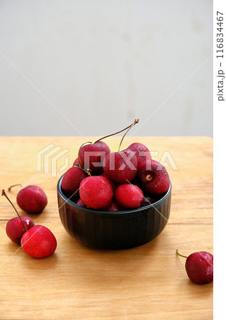 ripe cherries in a bowl 116834467