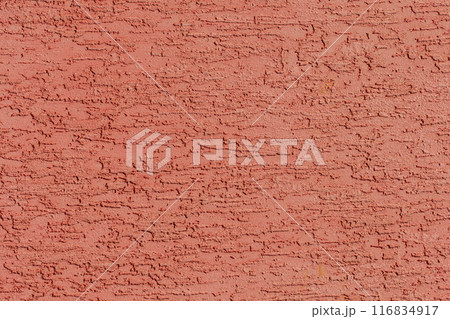 Red-brown plaster bark beetle wall stucco abstract pattern rough surface texture solid background coarse 116834917