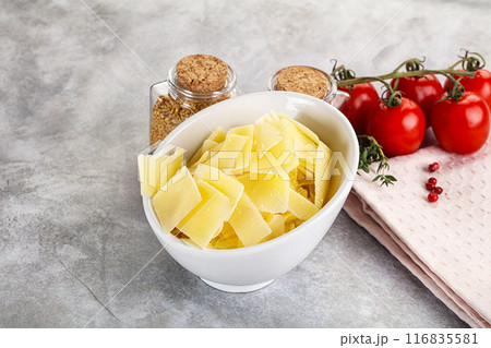 Sliced parmesan cheese in the bowl 116835581