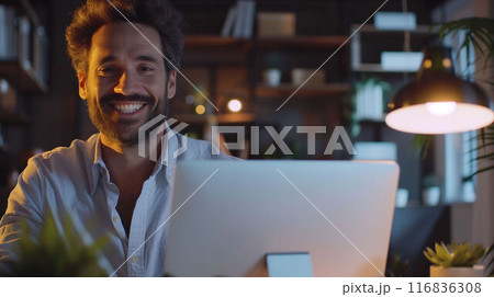 Businessman using laptop in office lobby . Happy entrepreneur, small business owner working online. 116836308