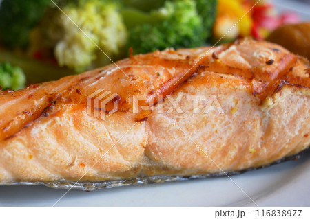 grill salmon served with fresh vegetables on a plate grill salmon served with fresh vegetables on a plate 116838977