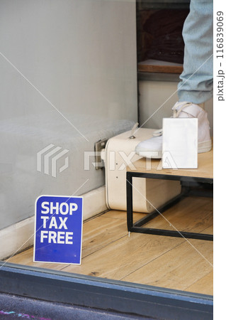 shop tax free text duty free shop sign on shop window shop tax free text duty free shop sign on shop window 116839069
