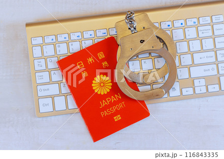 Police handcuff for law on Japan passports using hacker computer technology of criminal Police handcuff for law on Japan passports using hacker computer technology of criminal 116843335