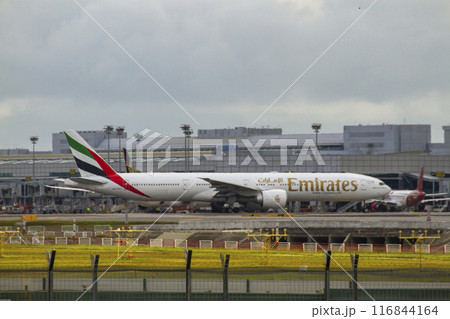 A Boeing 777 Airplane Of Emirates At Changi International Airport, Singapore. 116844164