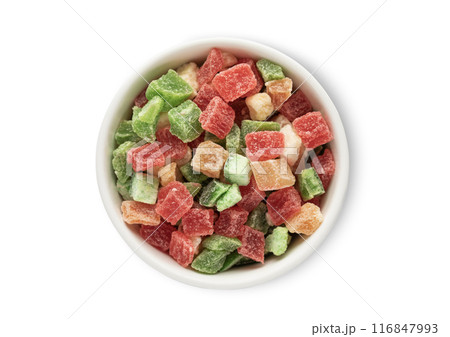 Bowl with dried sweet colorful fruit bites isolated on white background. 116847993