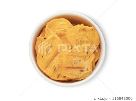 Ceramic bowl with dried orange healthy persimmon kaki pieces isolated on white background. 116848000