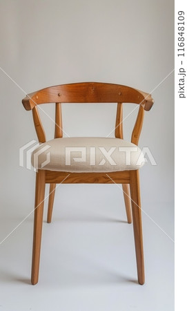 Wooden Chair with a White Cushion 116848109