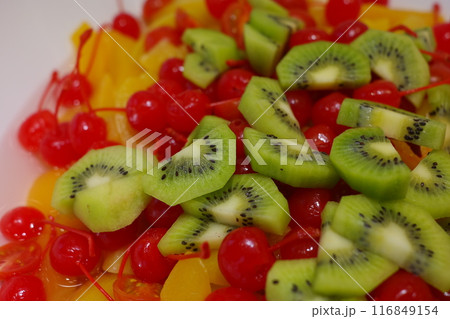 Fruit salad with cherry, kiwi and fruit cocktail Fruit salad with cherry, kiwi and fruit cocktail 116849154