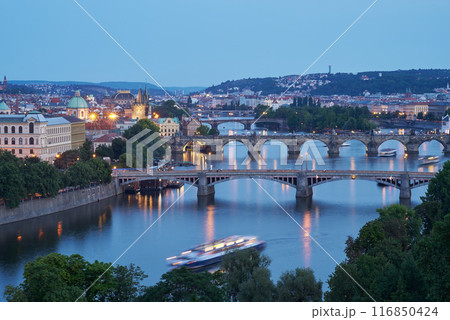 Aerial cityscape evening view of Prague, capital of Czech Republic, view from Letna park Aerial cityscape evening view of Prague, capital of Czech Republic, view from Letna park 116850424