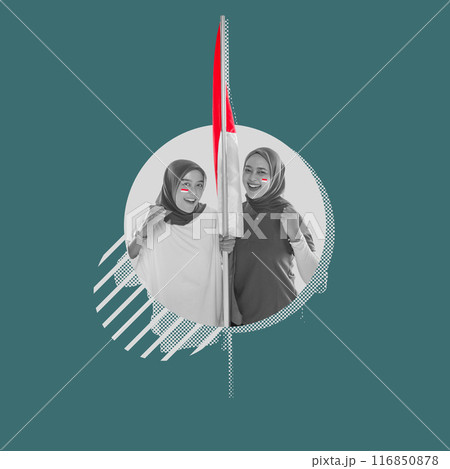 Portrait of two women with excited expressions holding Indonesian flags together 116850878