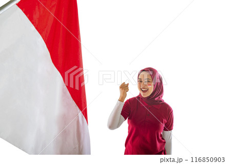 A portrait of a woman with an excited expression with the Indonesian flag 116850903