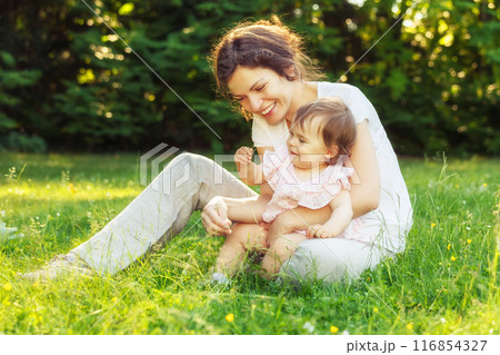 Mother with baby in the park Mother with baby in the park 116854327