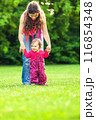 Mother with baby in the park 116854348