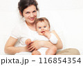 Mother playing with baby on white 116854354