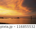 a beach with a beautiful sunrise 116855532