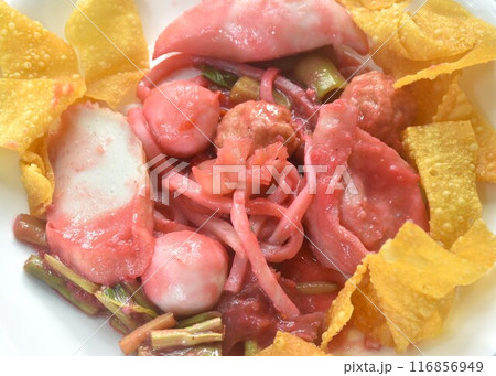 dry steamed fish and shrimp ball couple dumpling topping pickled cuttlefish dressing red soybean sauce on plate with soup dry steamed fish and shrimp ball couple dumpling topping pickled cuttlefish dressing red soybean sauce on plate with soup 116856949