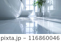 The bathroom floor is sparkling clean, Shiny white bathroom floor. 116860046
