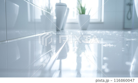 The bathroom floor is sparkling clean, Shiny white bathroom floor. The bathroom floor is sparkling clean, Shiny white bathroom floor. 116860047