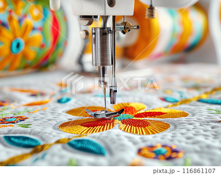 Sewing Machine Embroidering Colorful Patterned Fabric, a close-up view of a sewing machine in action Sewing Machine Embroidering Colorful Patterned Fabric, a close-up view of a sewing machine in action 116861107