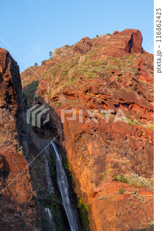 Rock and a waterfall, Madeira, Portugal Rock and a waterfall, Madeira, Portugal 116862425
