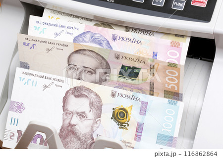 Ukrainian hryvnia in the counting machine 116862864