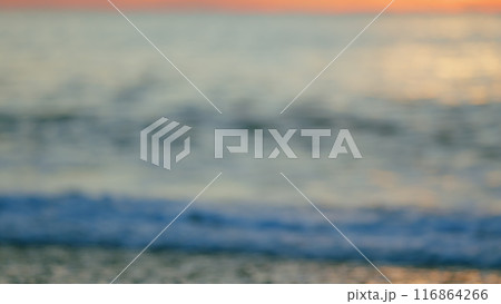 Setting Sun On Sea. Colorful Orange Sunlight Reflect On Sea Landscape With Summer Travel Concept. Blur. Setting Sun On Sea. Colorful Orange Sunlight Reflect On Sea Landscape With Summer Travel Concept. Blur. 116864266