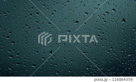 Water Drops On Glass Background. Reflected Light. Macro view. Water Drops On Glass Background. Reflected Light. Macro view. 116864359