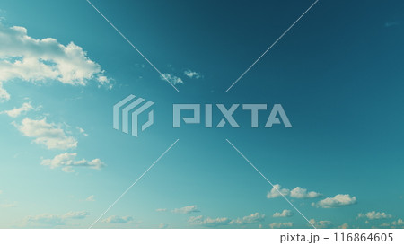 Vast Blue Sky And Clouds. White Curly Clouds In Blue Sky. Beautiful Blue Sky And Clouds. Vast Blue Sky And Clouds. White Curly Clouds In Blue Sky. Beautiful Blue Sky And Clouds. 116864605