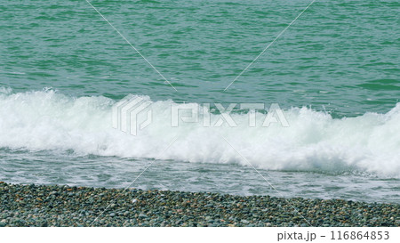 Coastal Seascape Ocean Water With Raging Stormy Sea Waves. Clear Blue Sea Waves Breaking. Slow motion. 116864853