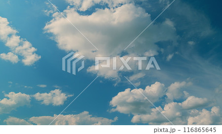 Landscape White Clouds Moving In Opposite Direction. White Clouds Nature. Heavenly Sky With Fresh Clean Air And Blue Skies. White Clouds Background. Landscape White Clouds Moving In Opposite Direction. White Clouds Nature. Heavenly Sky With Fresh Clean Air And Blue Skies. White Clouds Background. 116865645